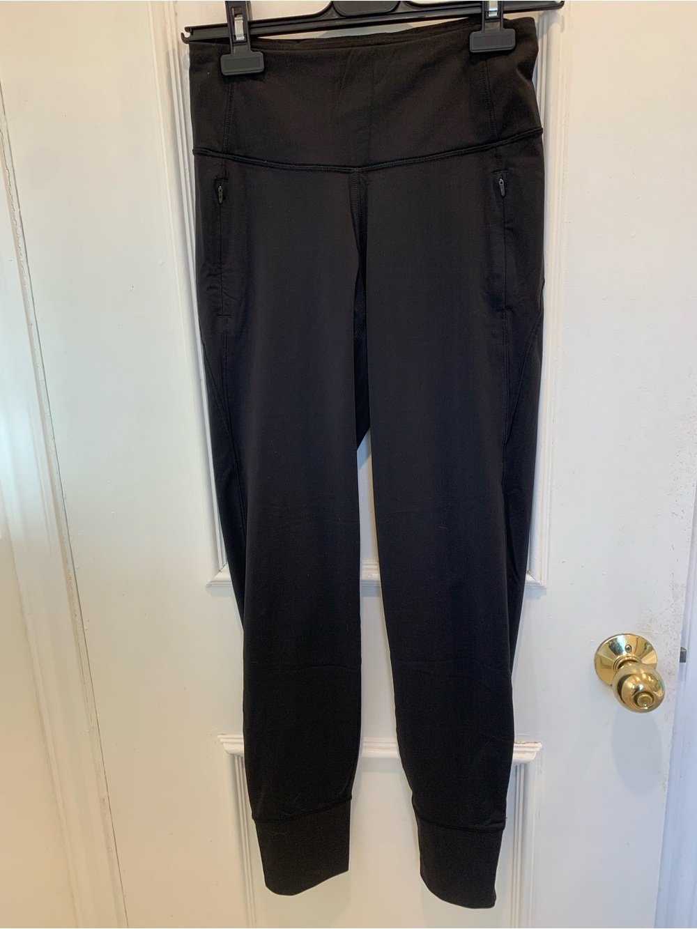 Lululemon black running leggings w/ankle zippers. Reflective detail. Size 2
